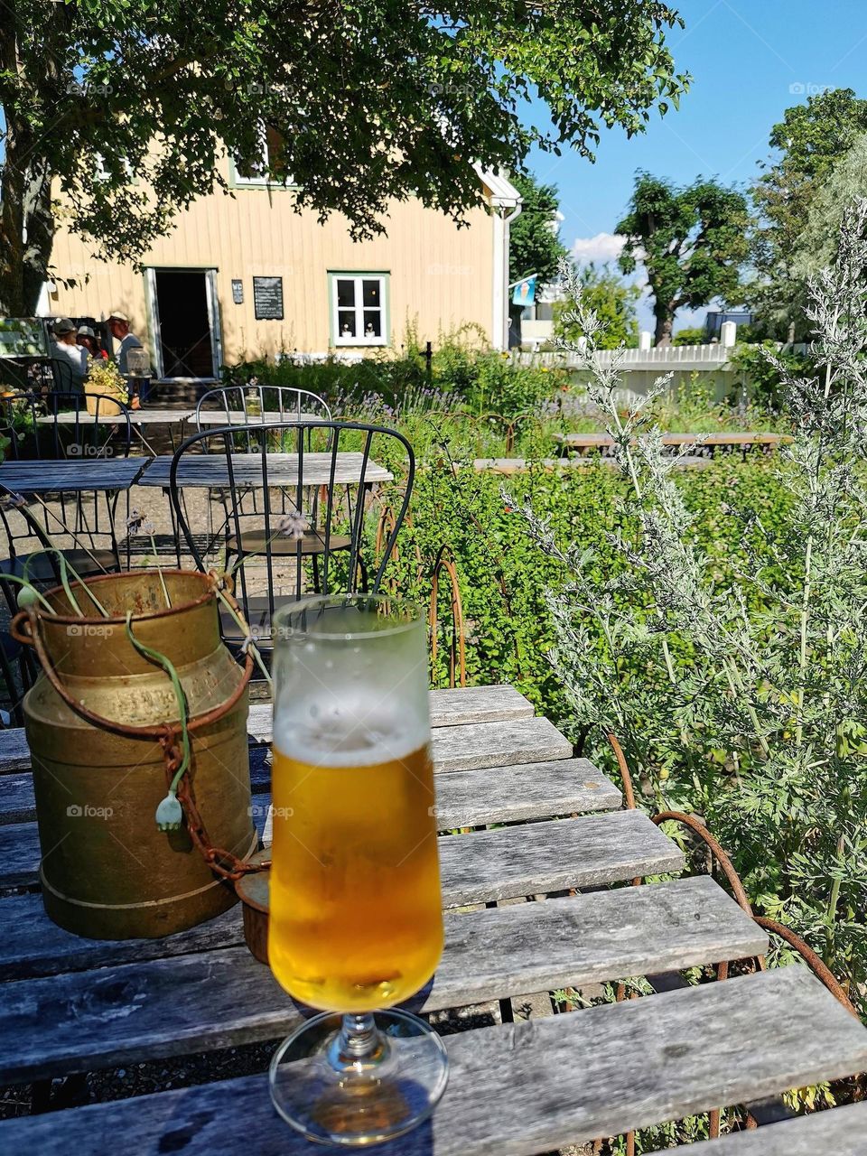 A glass of beer at the outdoor cafe