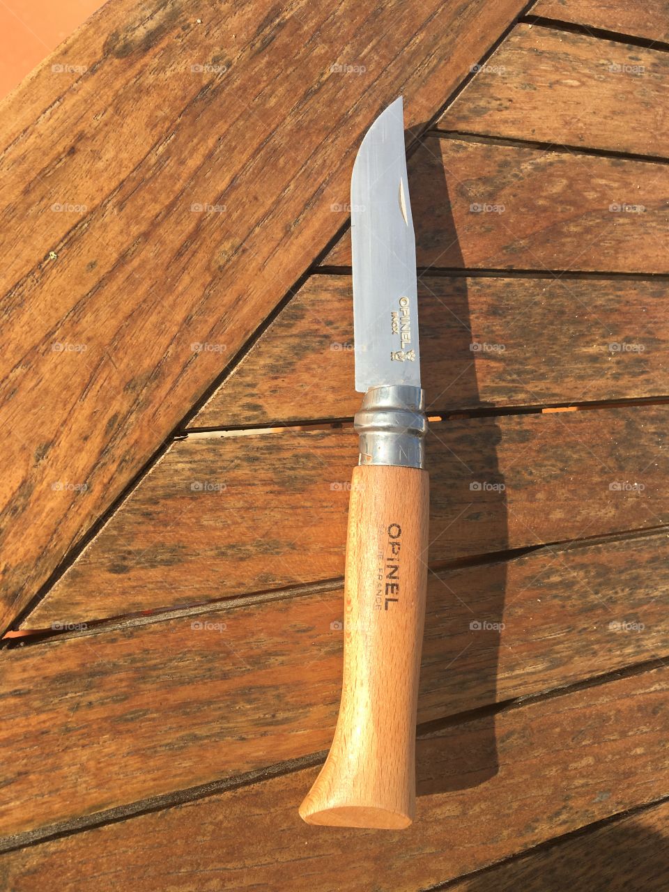 Knife on a wooden table