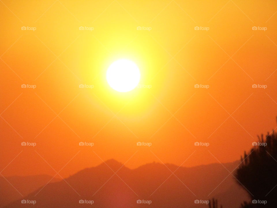 sunset in the distant mountain tops. 