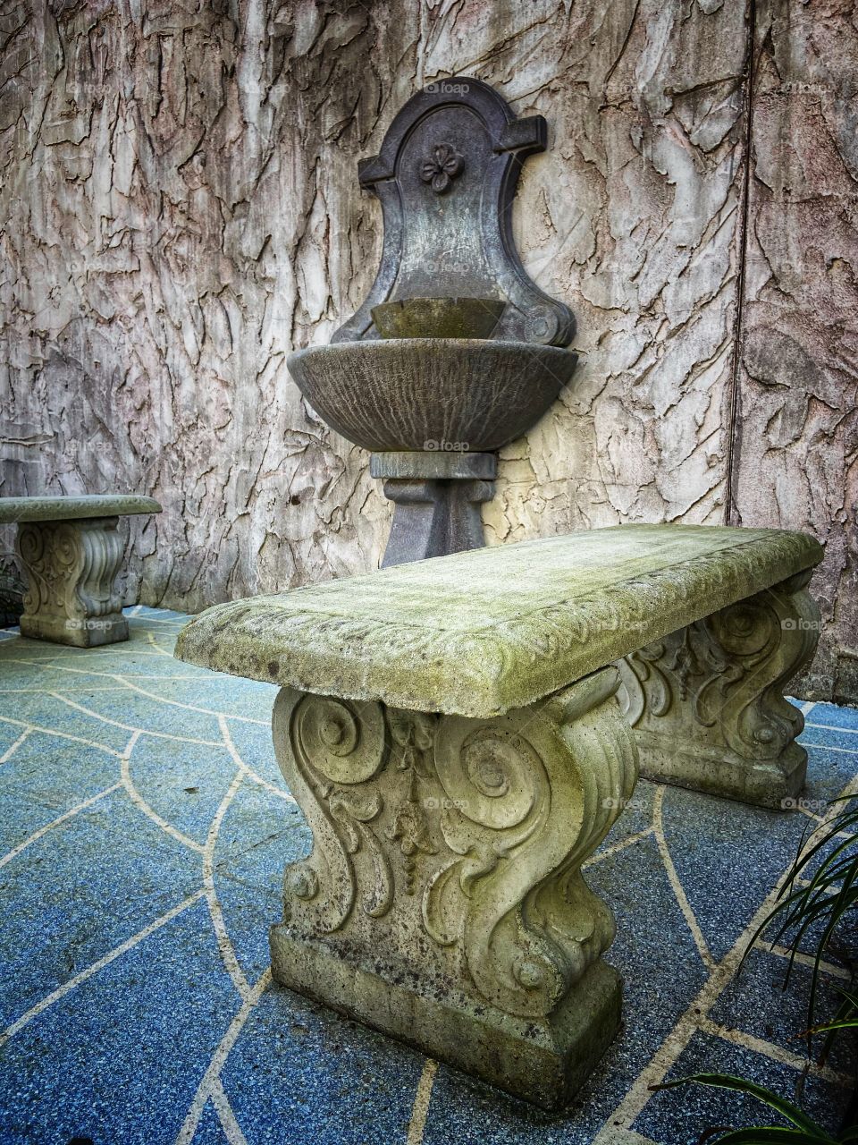 Stone bench and fountain