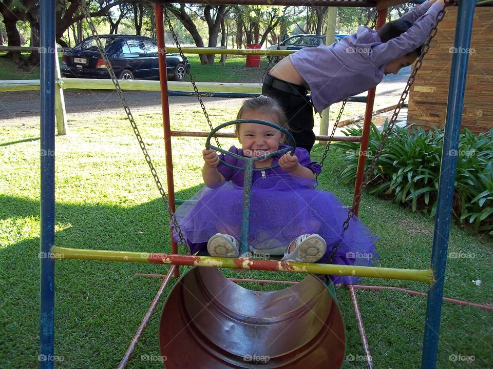 Ring bearer and flower girl playing