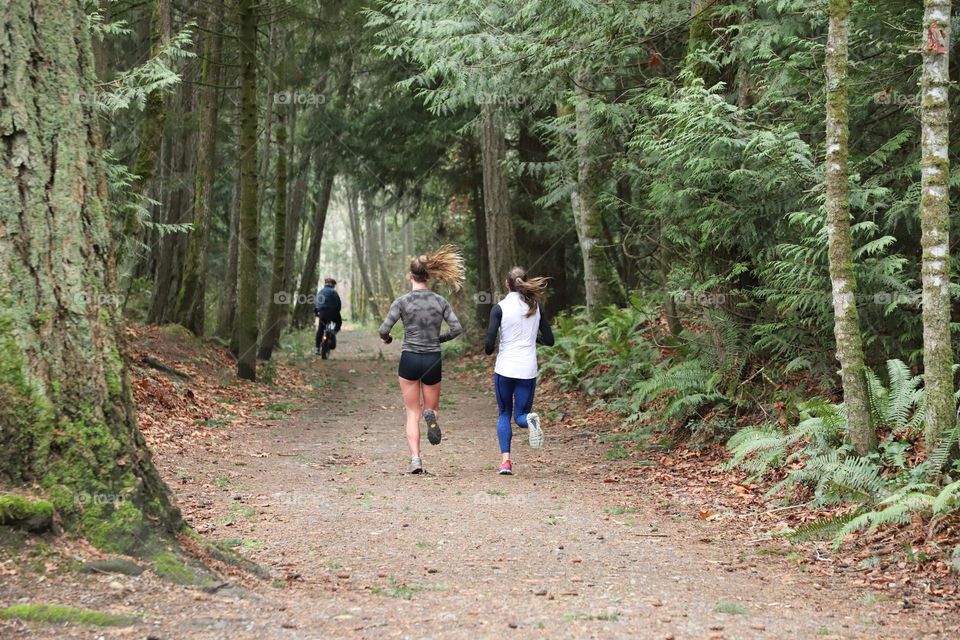 Runners on a trail