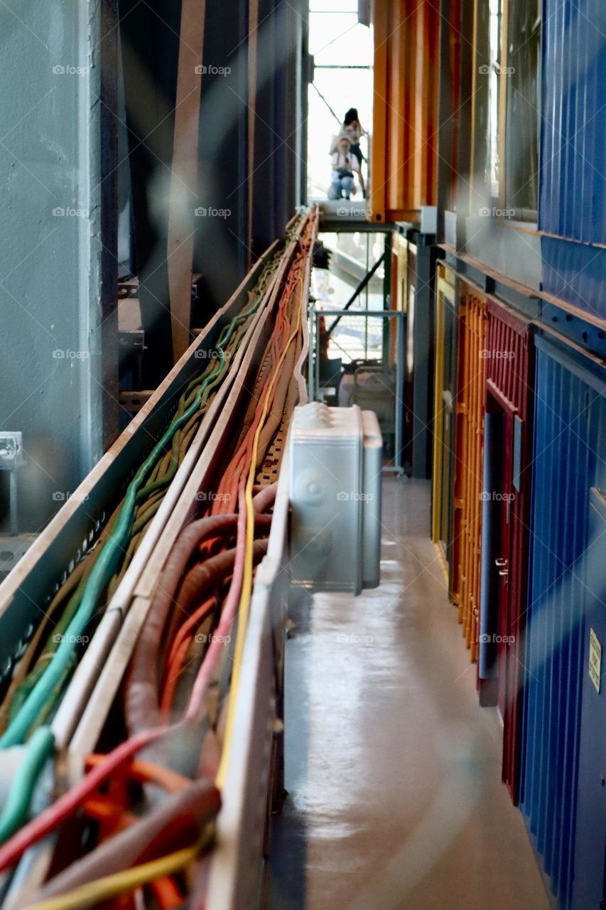 Colourful container building and colorful cables 