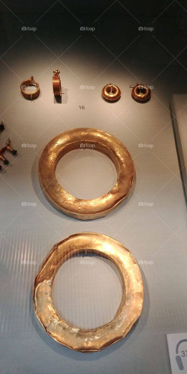 anciant gold jewellery in museum case