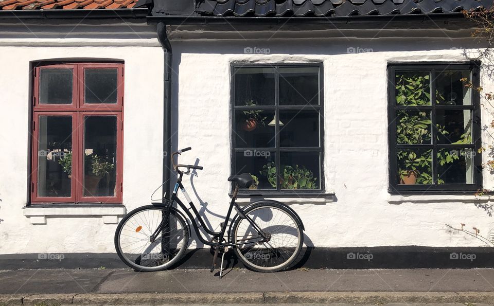 Bicycle by the windows