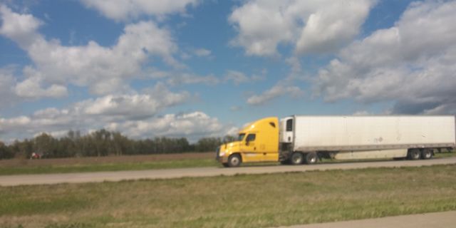 trucker clouds highway driving