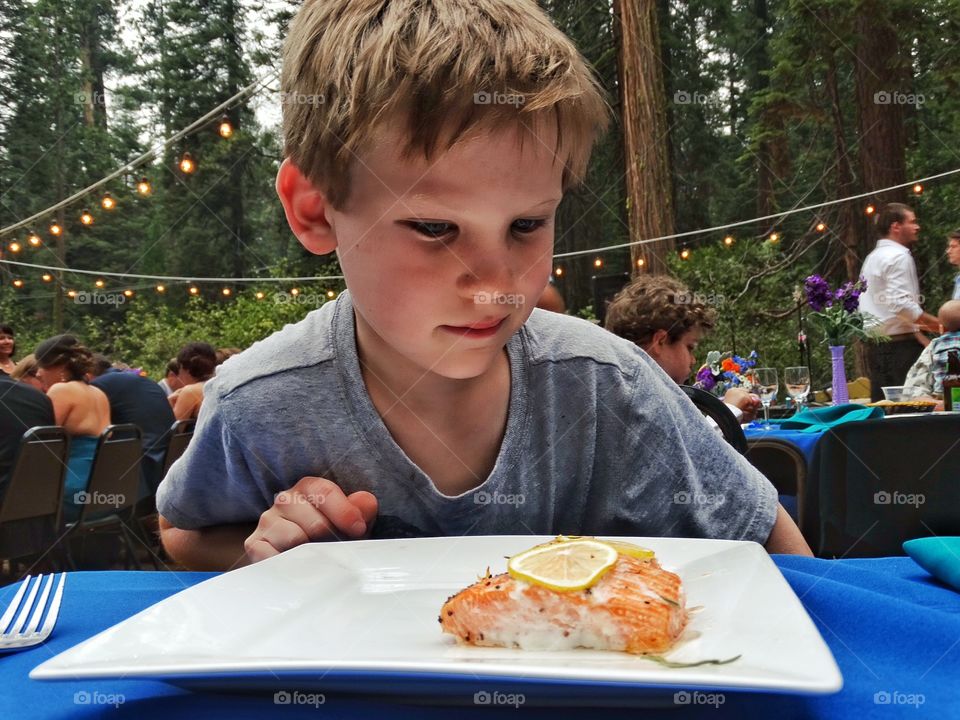 Picky Eater. Young Boy About To Eat His Favorite Food
