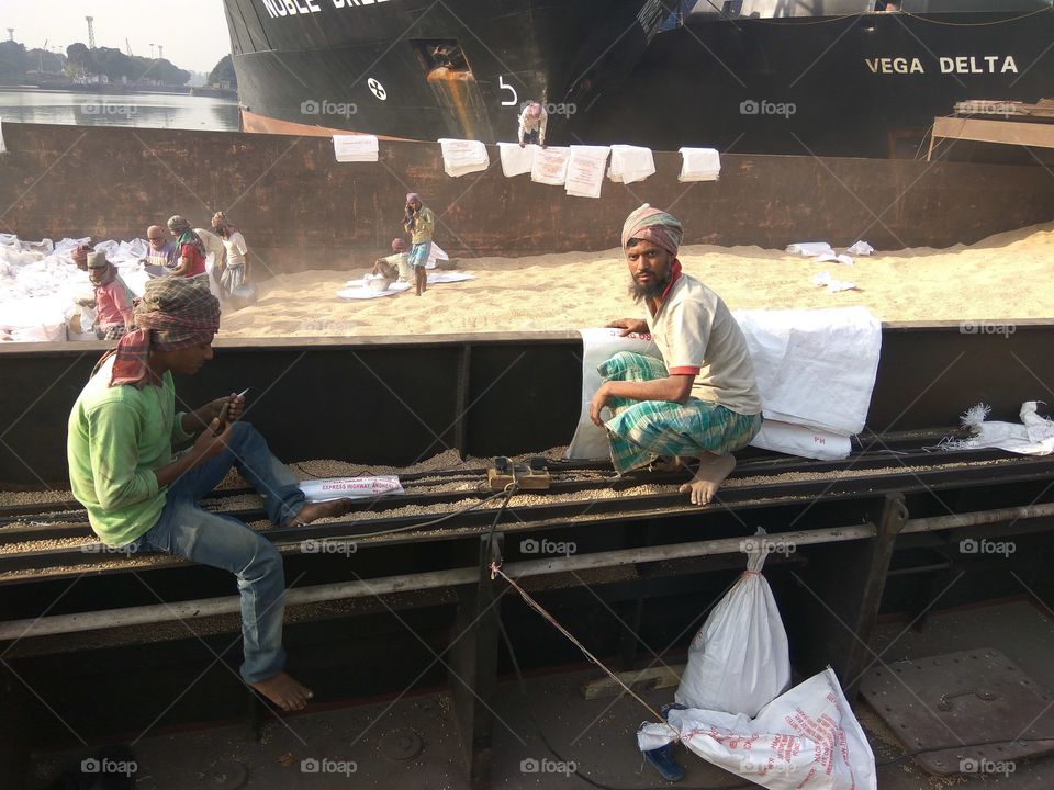 Labour Working in Food Grain Ship At Kolkata Port India