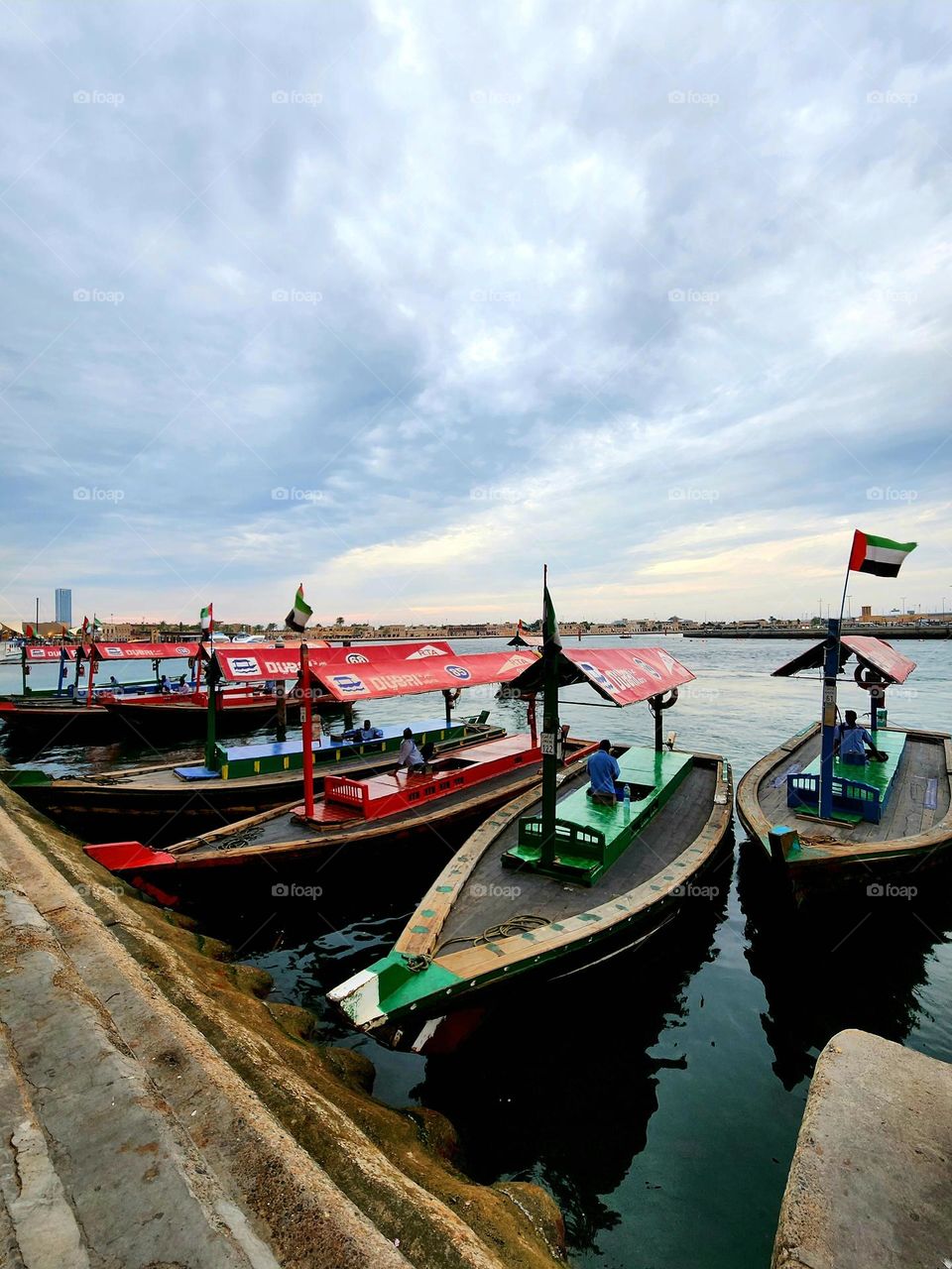 An abra is a traditional boat made of wood. Abras are used to ferry people across Dubai Creek in Dubai, United Arab Emirates.