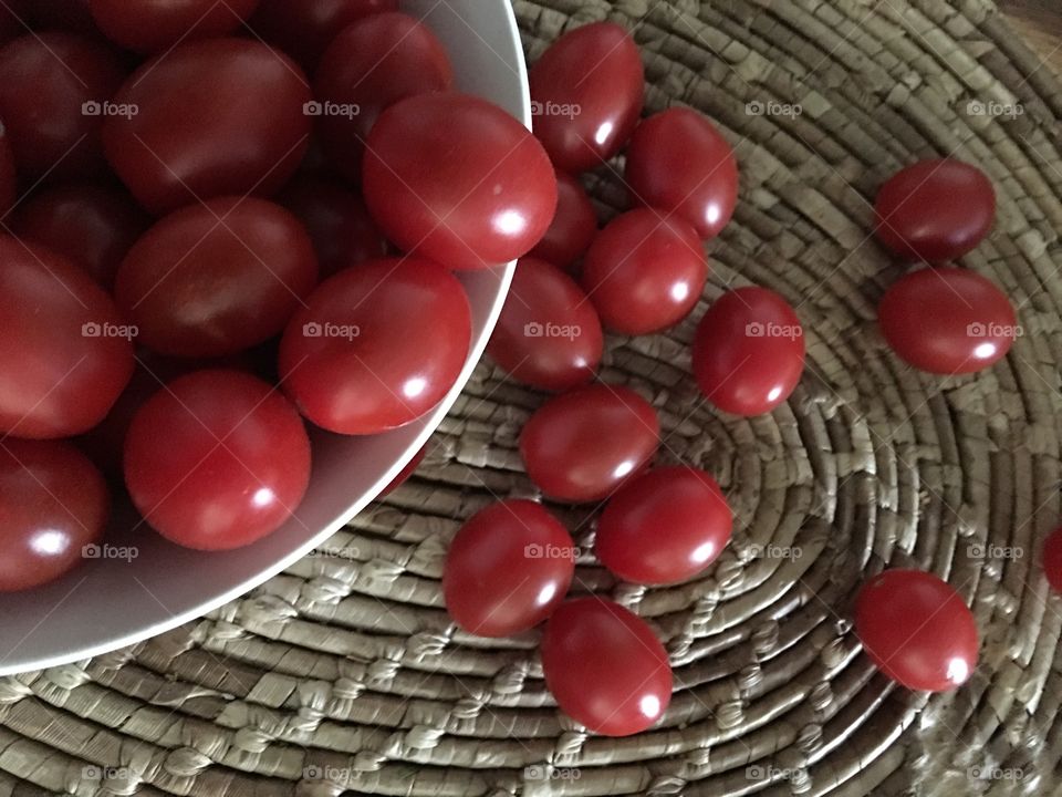 Tomatoes spilling over 