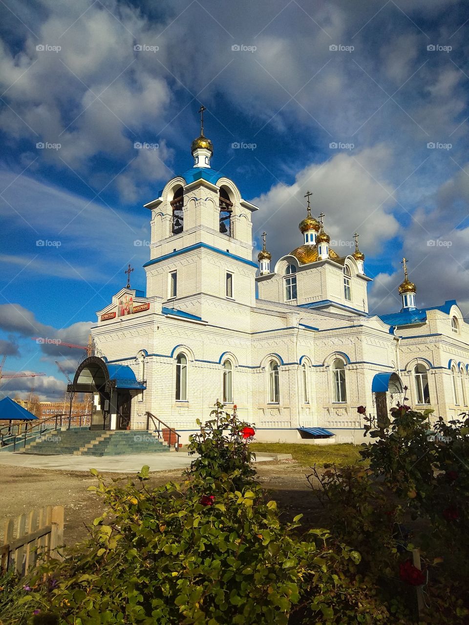 View of St. Nicholas Church (Russia, Ulyanovsk) under a very beautiful cloudy sky on a sunny autumn day