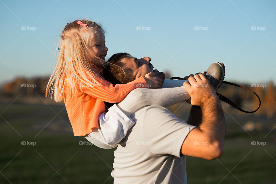 Happy father and child spending time outdoors