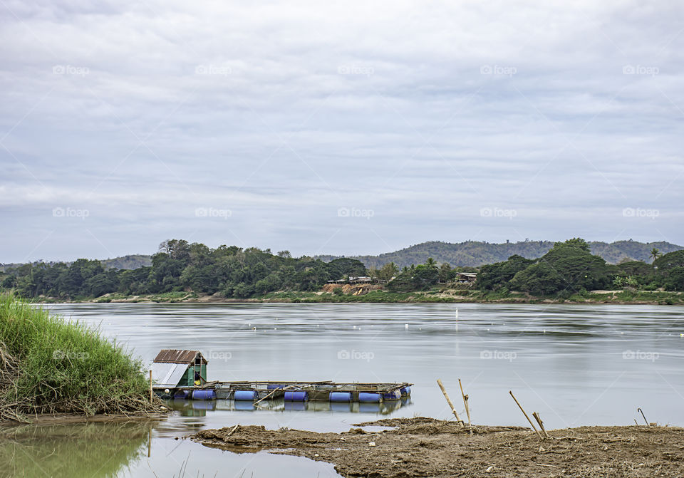 The raft floating fish farming and sky on the Mekong River at Loei in Thailand.