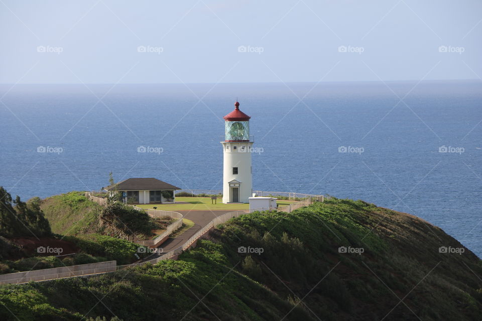 Lighthouse and view point on top of the cliff in Kauai