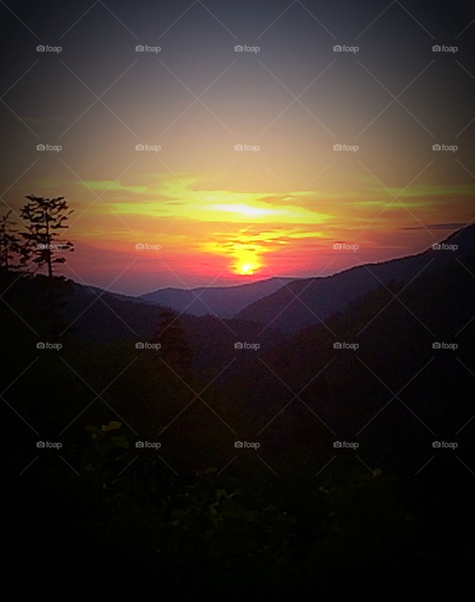 Breathtaking Sunset over the Smokies. Gorgeous sunset captured high atop the Smoky Mtns. of TN & NC! 