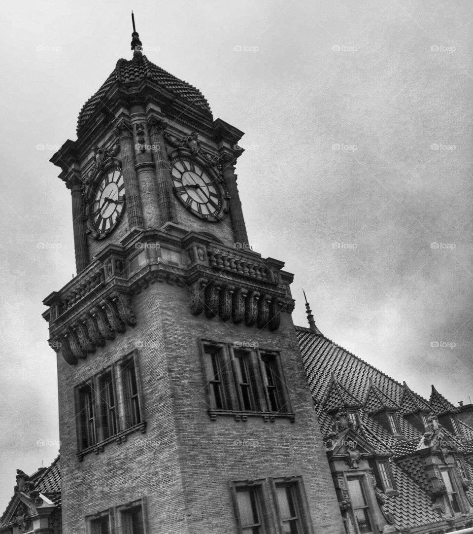 Clock tower. A black and white clock tower 