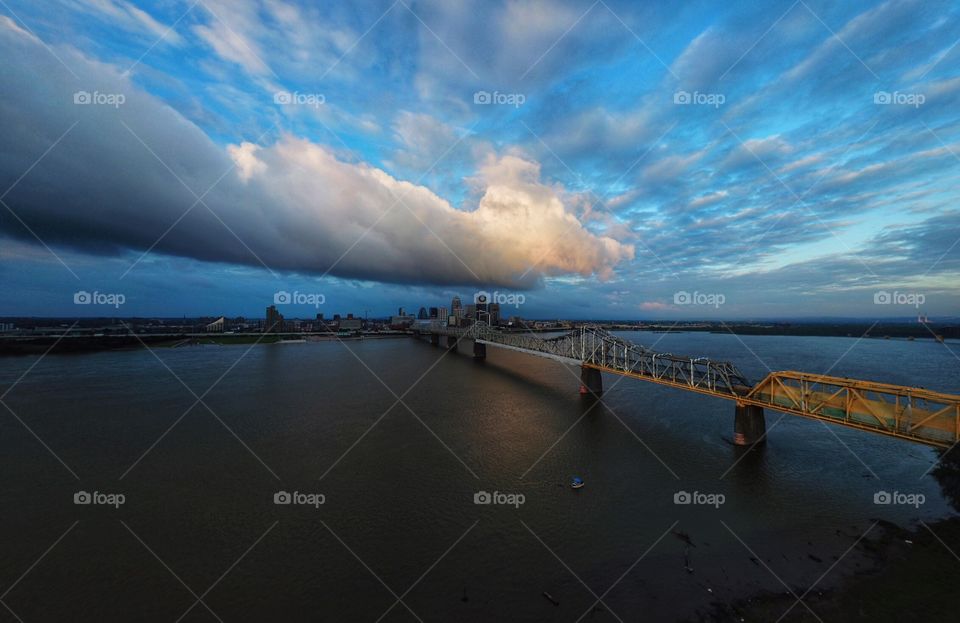 Cloudy sunrise in Downtown Louisville. Skyline, Kennedy Bridge and the Ohio River