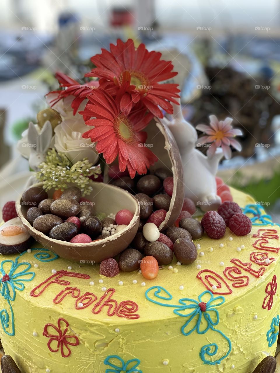 birthday cake for Easter, eggs, sweets, chocolate, flowers, decorated table for the holiday
