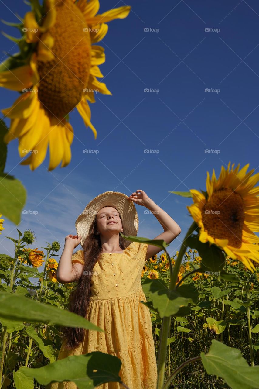 Girl with sunflowers