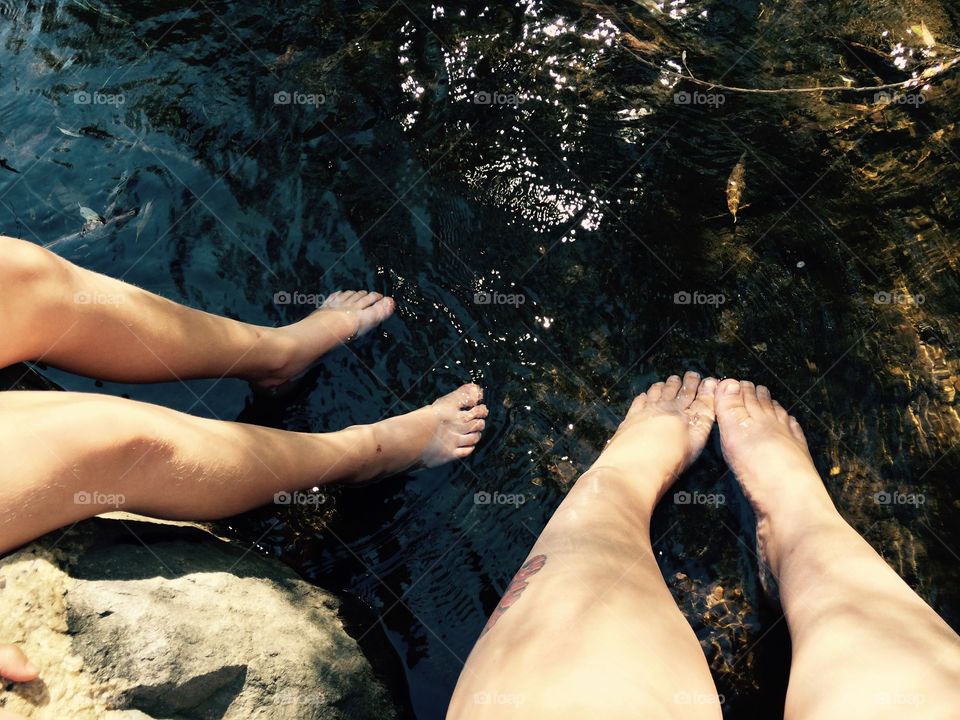 Feet in stream. Cooling off in a stream