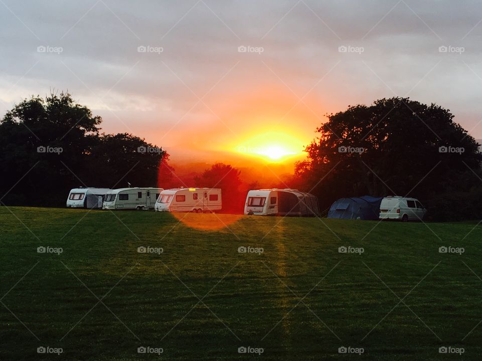 Lovely photo I took on a caravan site ! Lovely lens flare! Great for wallpapers ! Since I have used it myself , I was very happy with it! Also great for photoshop manipulators! *CHEAP* highly recommend!