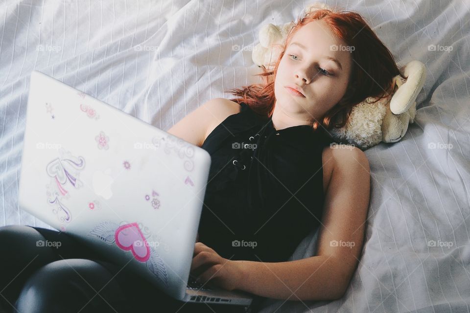 Girl with her computer