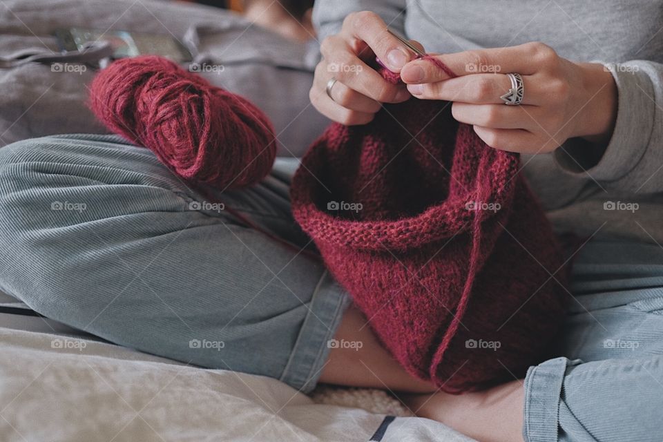 Woman’s hands knitting 