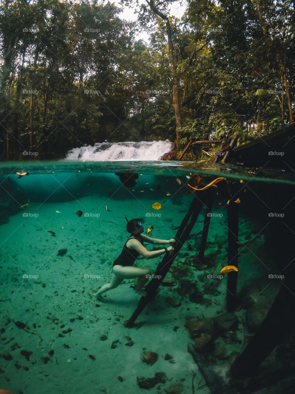 Diving into the blue waterfall