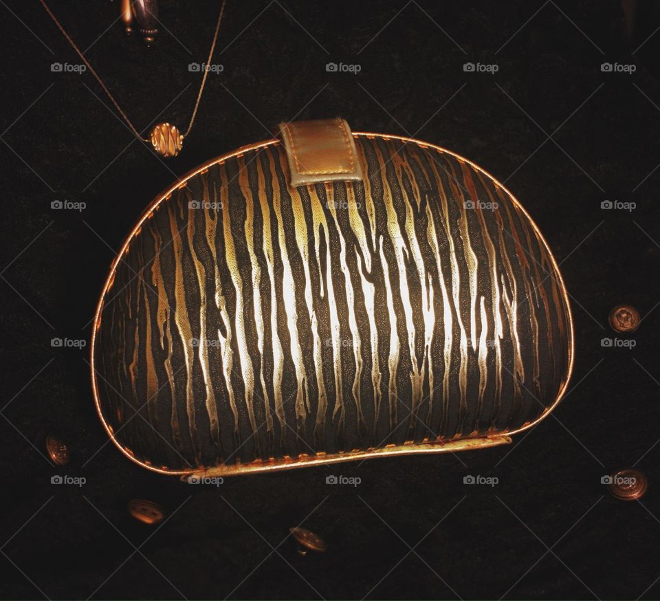 Gold zebra print purse