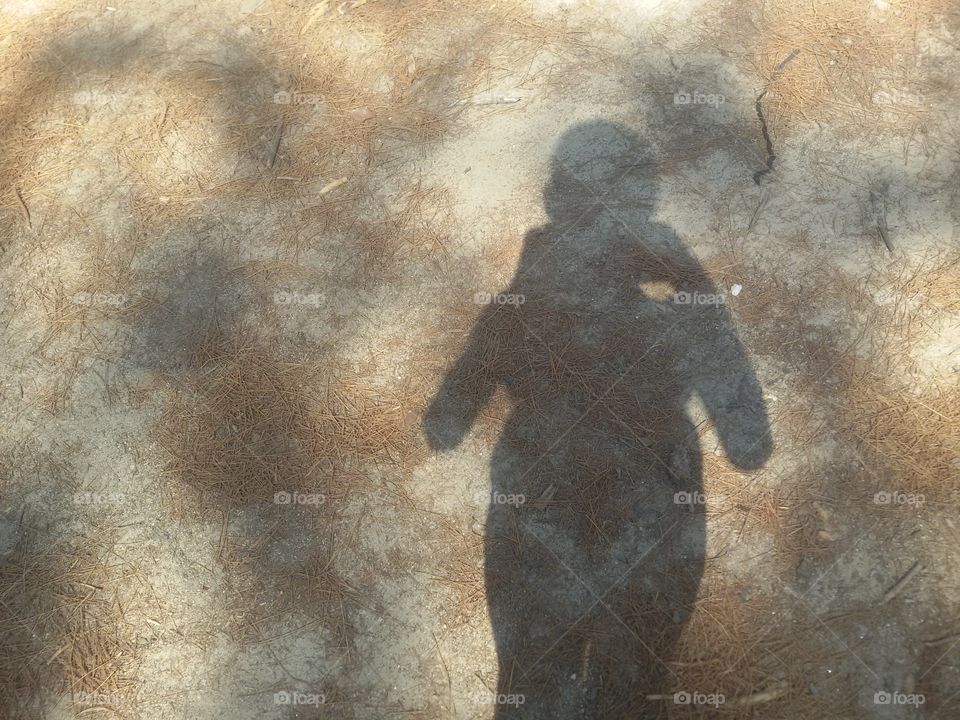 Kids shadow on the beach