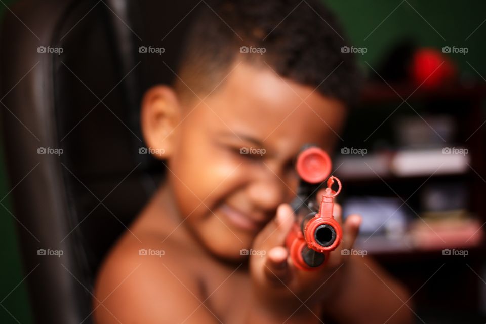 Child with Gun...