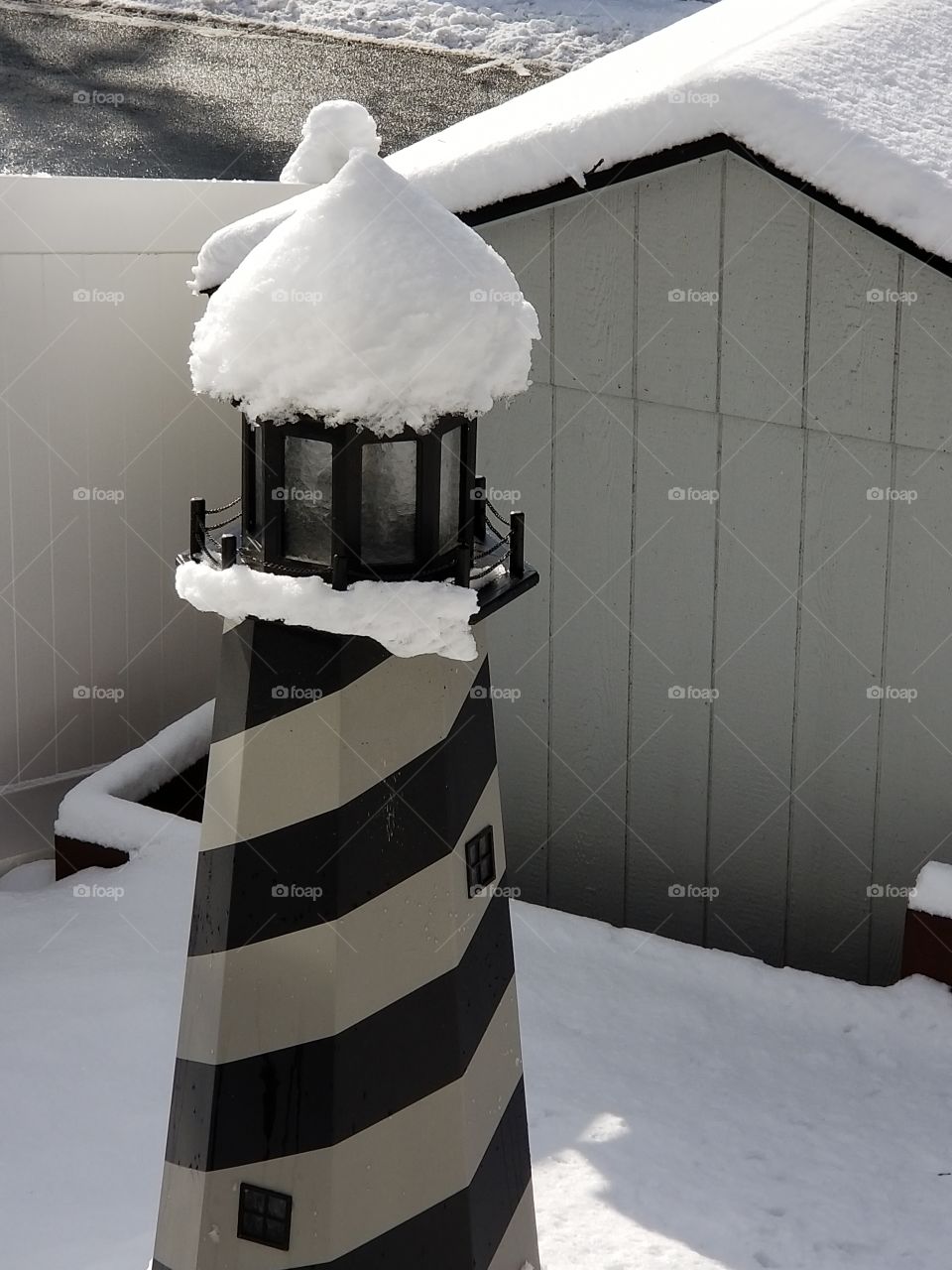 lighthouse in the snow