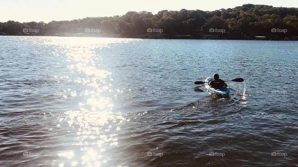 Gorgeous early morning kayak adventure for this young man turns out to be a great way to get some exercise! 