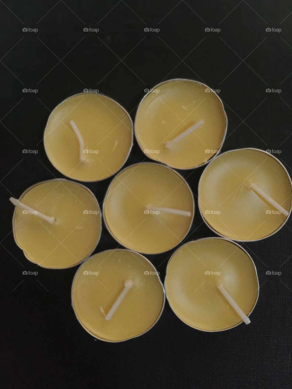 Yellow color is associated with sun, symbolizes optimism, energy, intellect, joy, happiness and friendship.
Tea candle because of their small size and low level of light, multiple tea lights are often burned simultaneously.