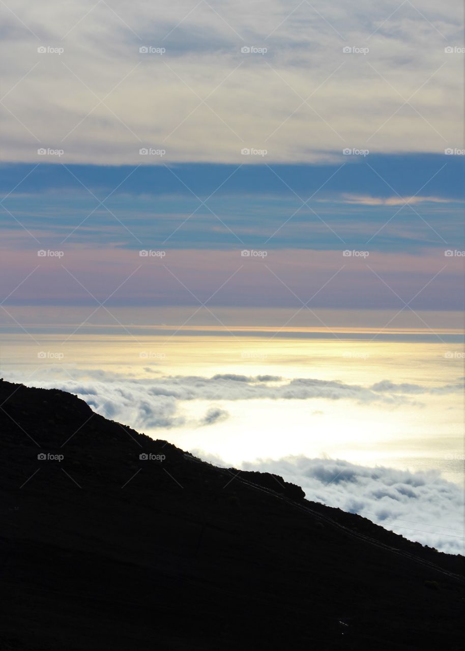 Sun below the clouds