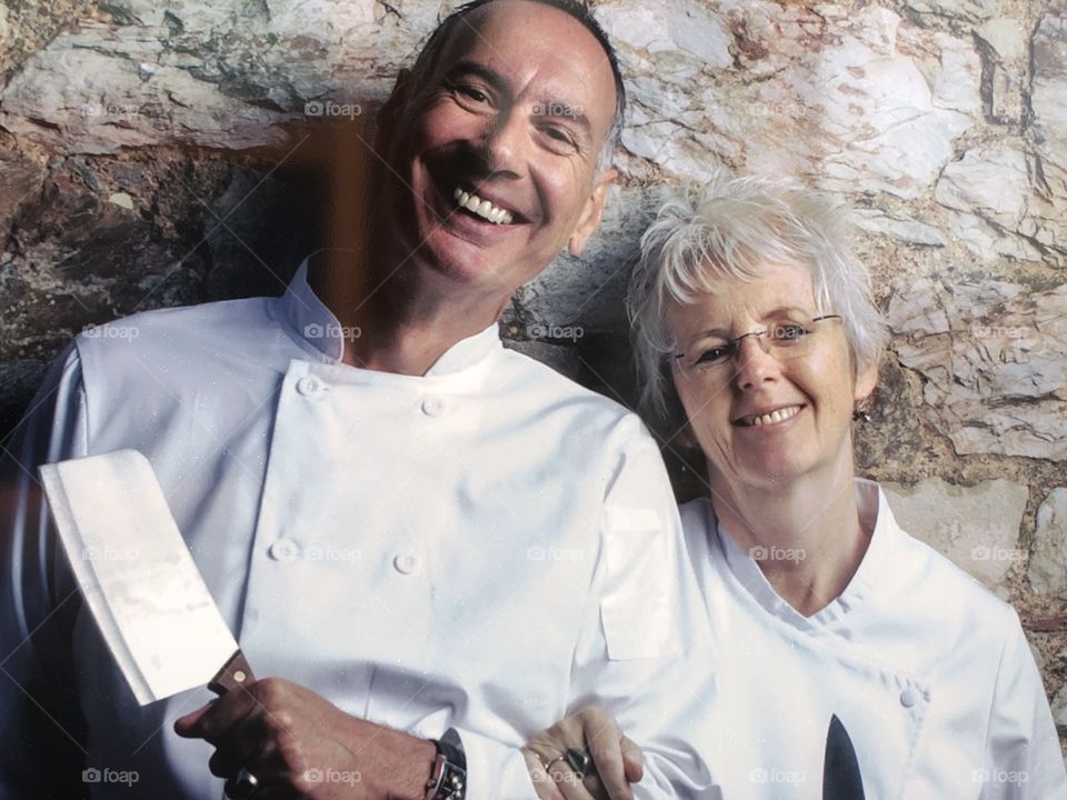 A photo of some very happy chefs going about their trade in high spirits. 