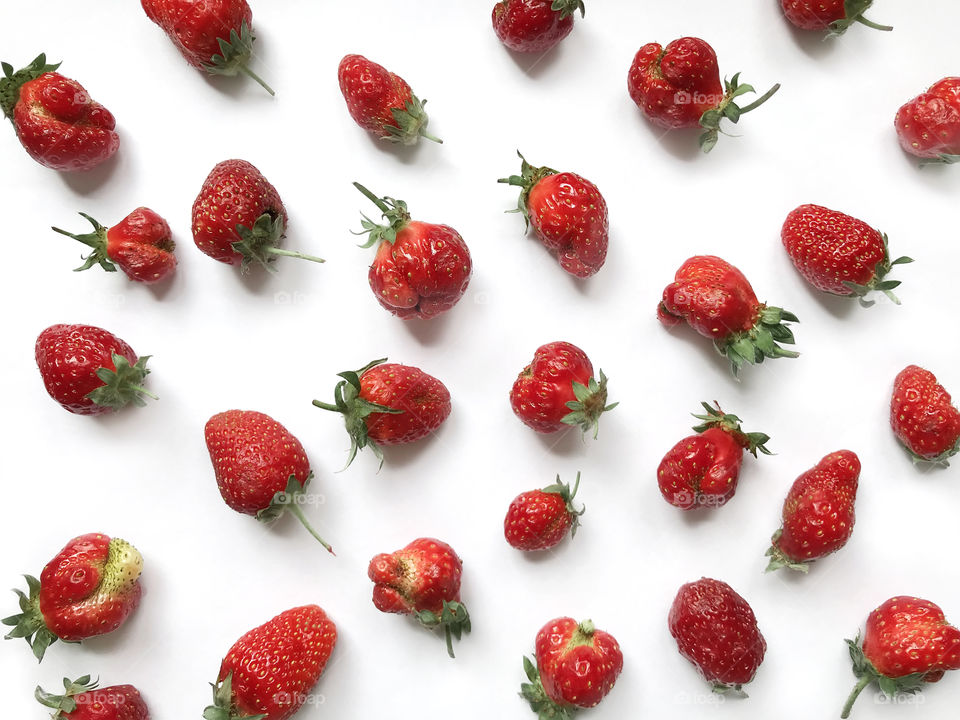 Red ripe strawberries on white background 