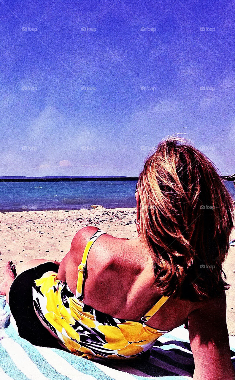 beach woman calm by clarity