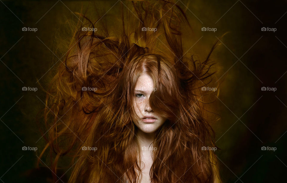 Redhair girl on the wind