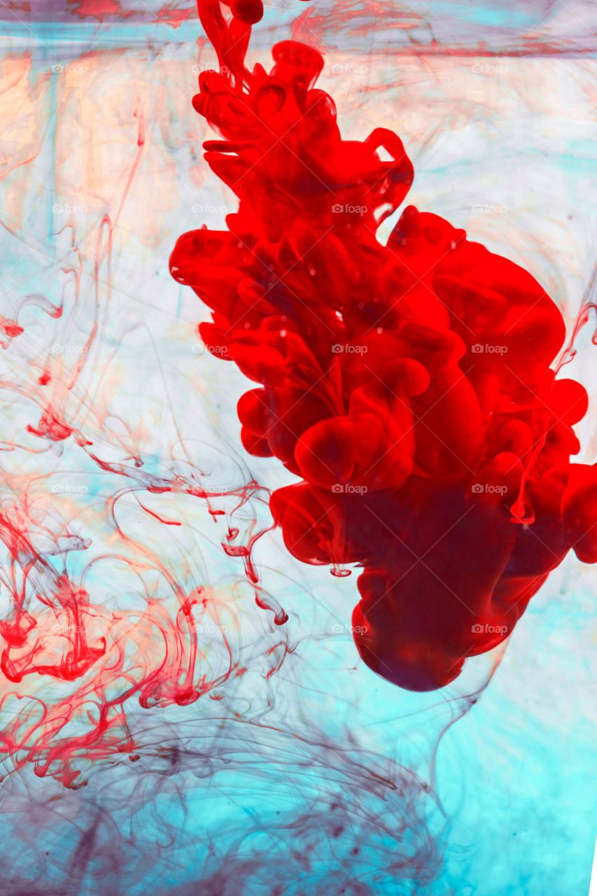 Red Ink On Yellow And Blue