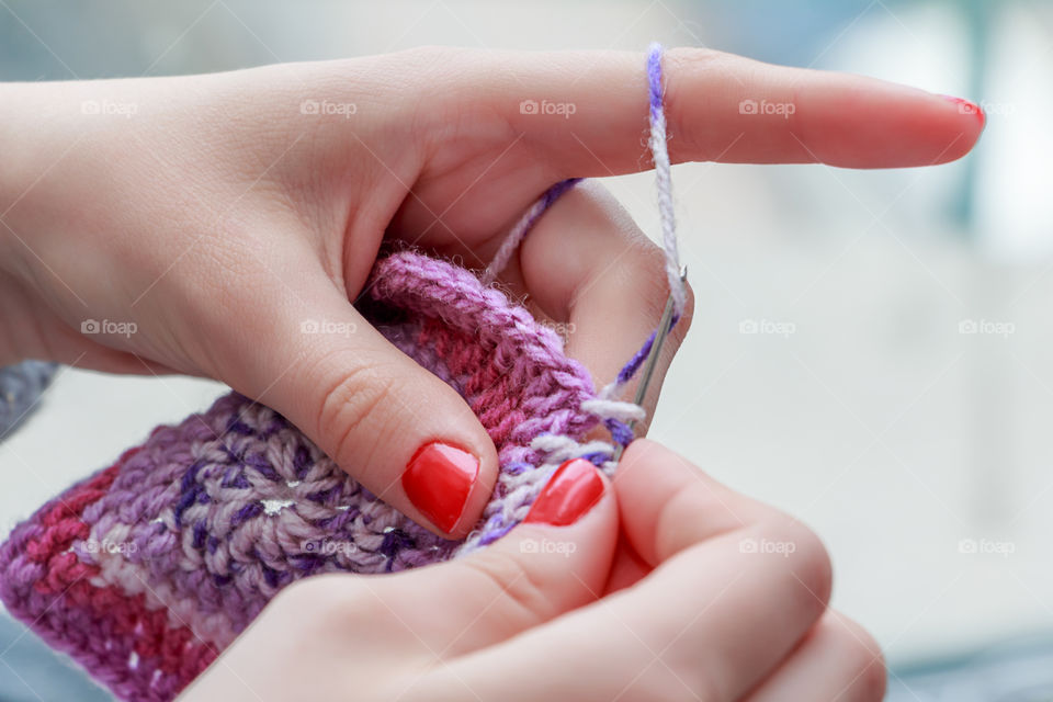 Close-up of woman knitting