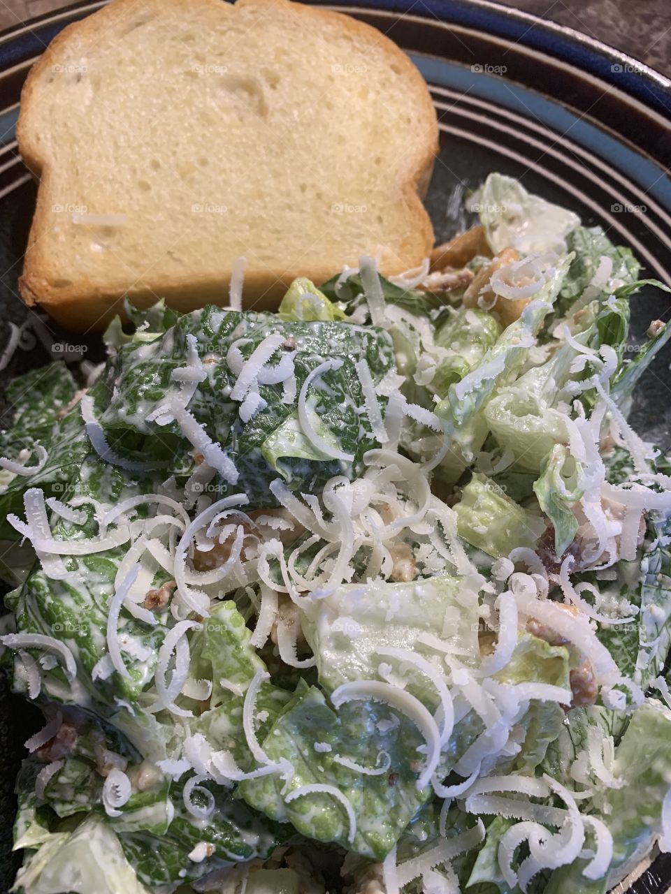 Chicken Caesar salad and garlic toast 