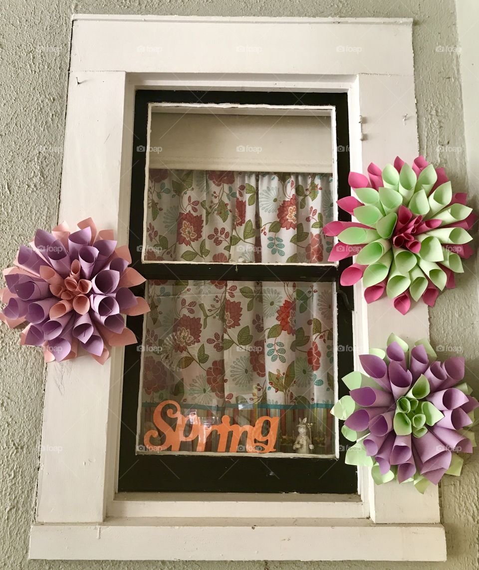 Paper flower decorations on Window