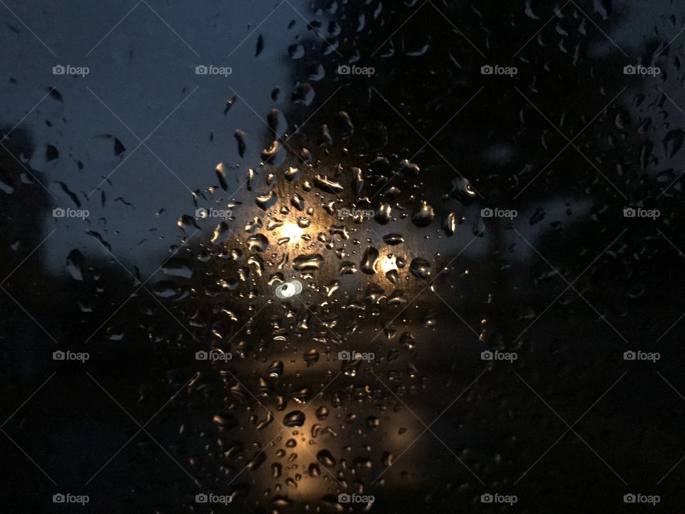 Rain on the window at night