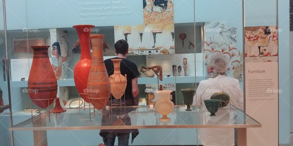 view of display cases in museum being viewed