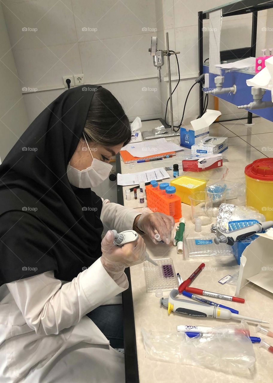 Veterinary laboratory workdesk in live sample testing