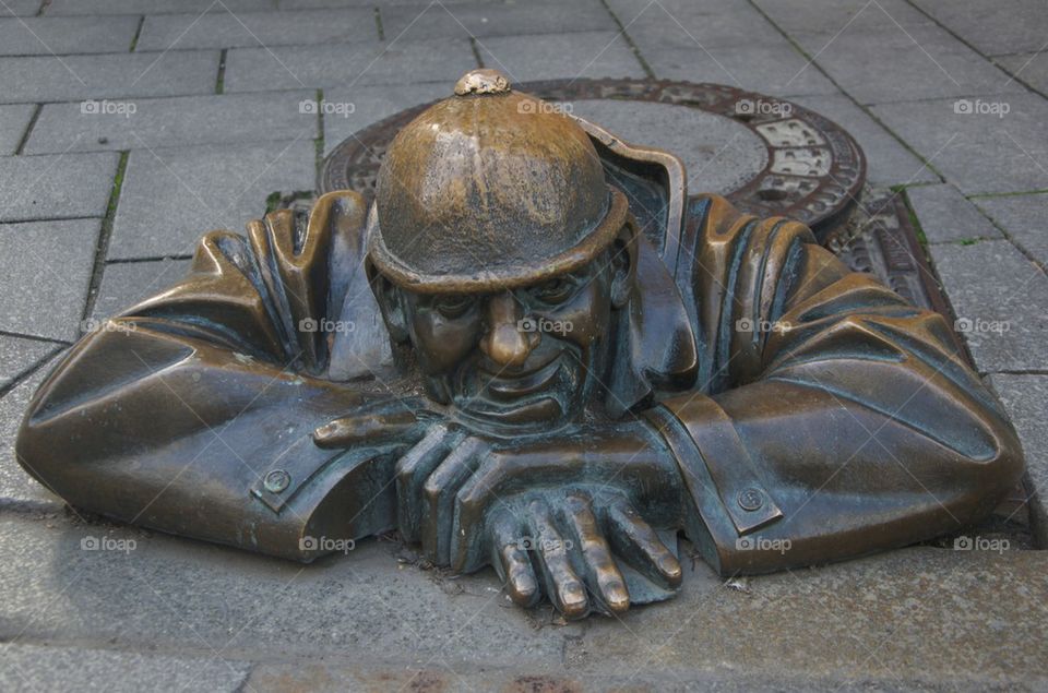 Man at work, bronze sculpture in Bratislava