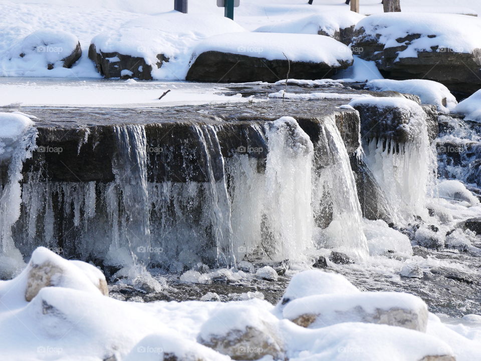 A walk through a winter wonderland, minutes into the local downtown area. Ice, snow, trees, water, and a little wildlife for good measure!