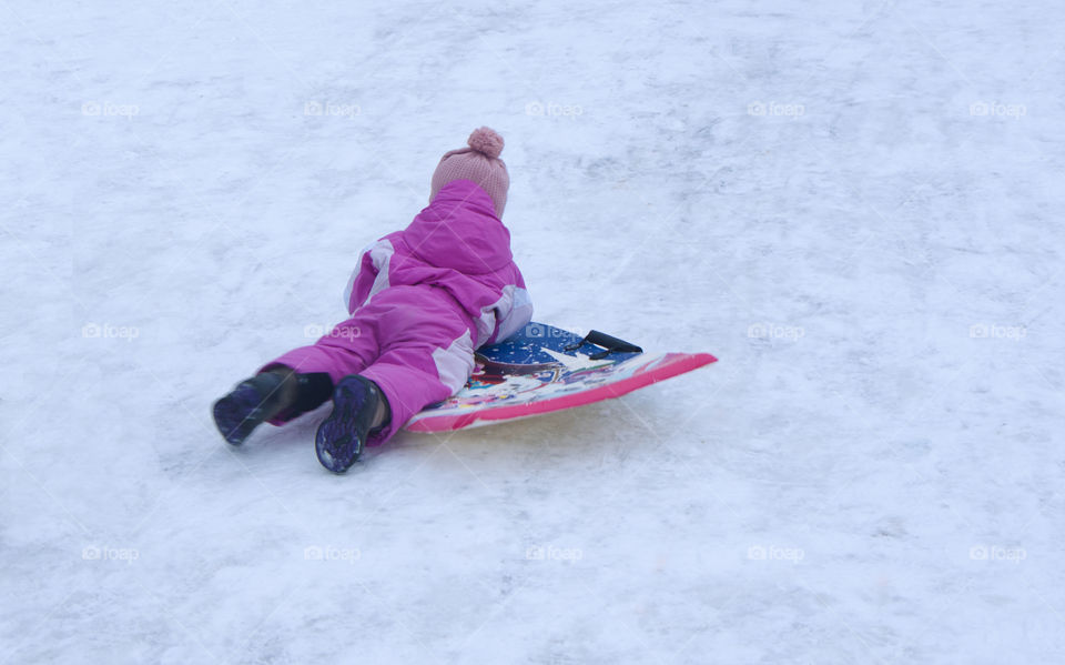 children play in the winter outdoors