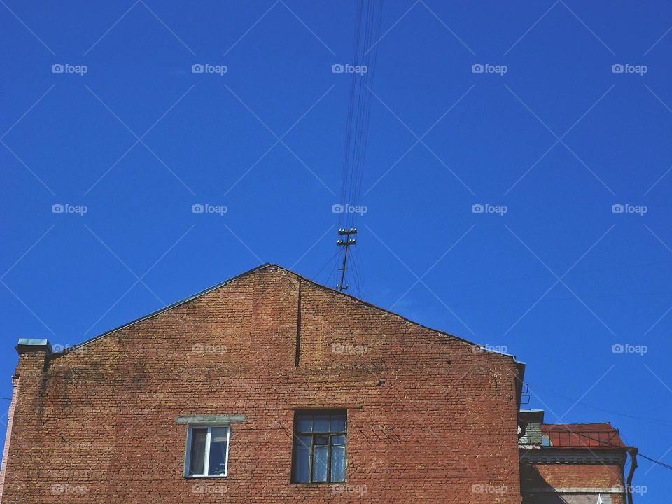 house with windows against the sky